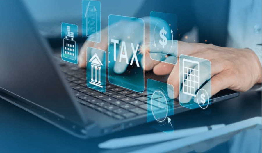 Digital tax icons displayed over a laptop keyboard