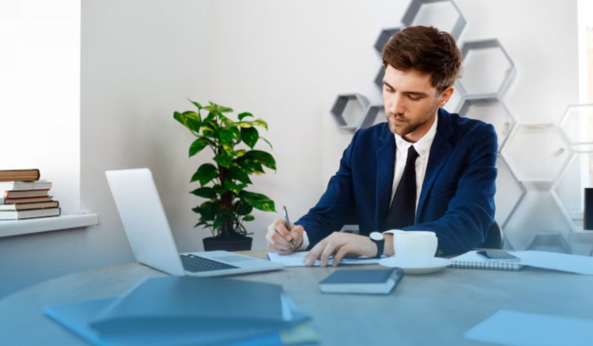 Sole trader working on business finances at a desk
